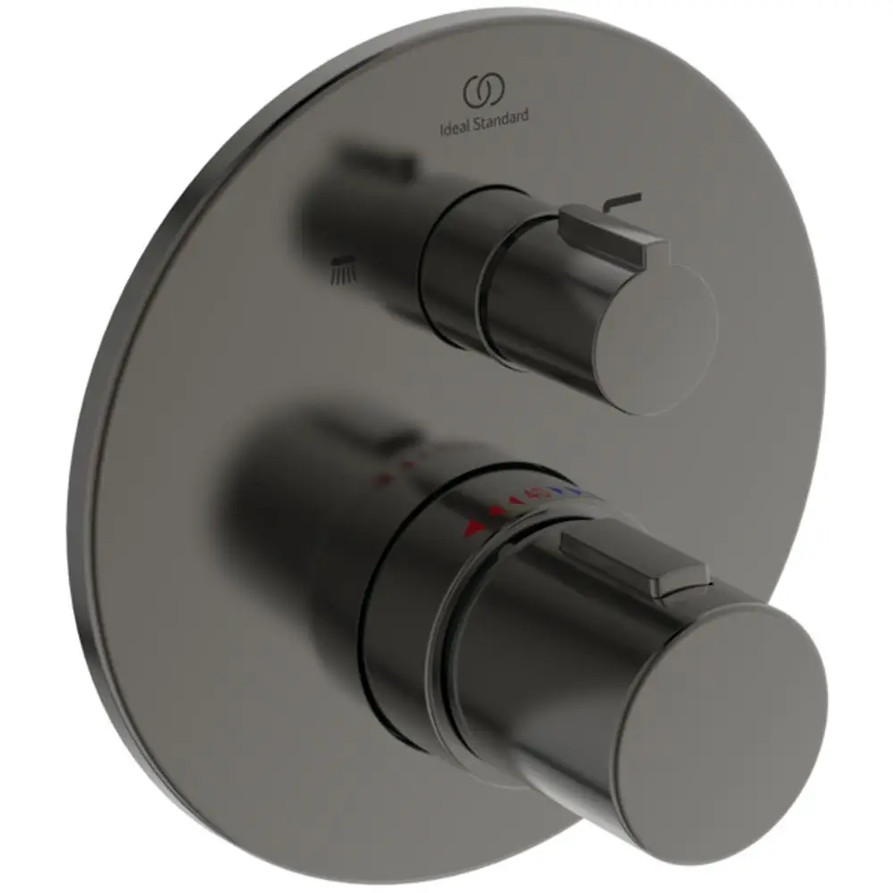 Thermostat von Ideal Standard in schimmerndem Grau. Das Bedienfeld hat zwei Drehknöpfe zur Einstellung von Wassertemperatur und -quelle. Runde Rosette im Hintergrund.